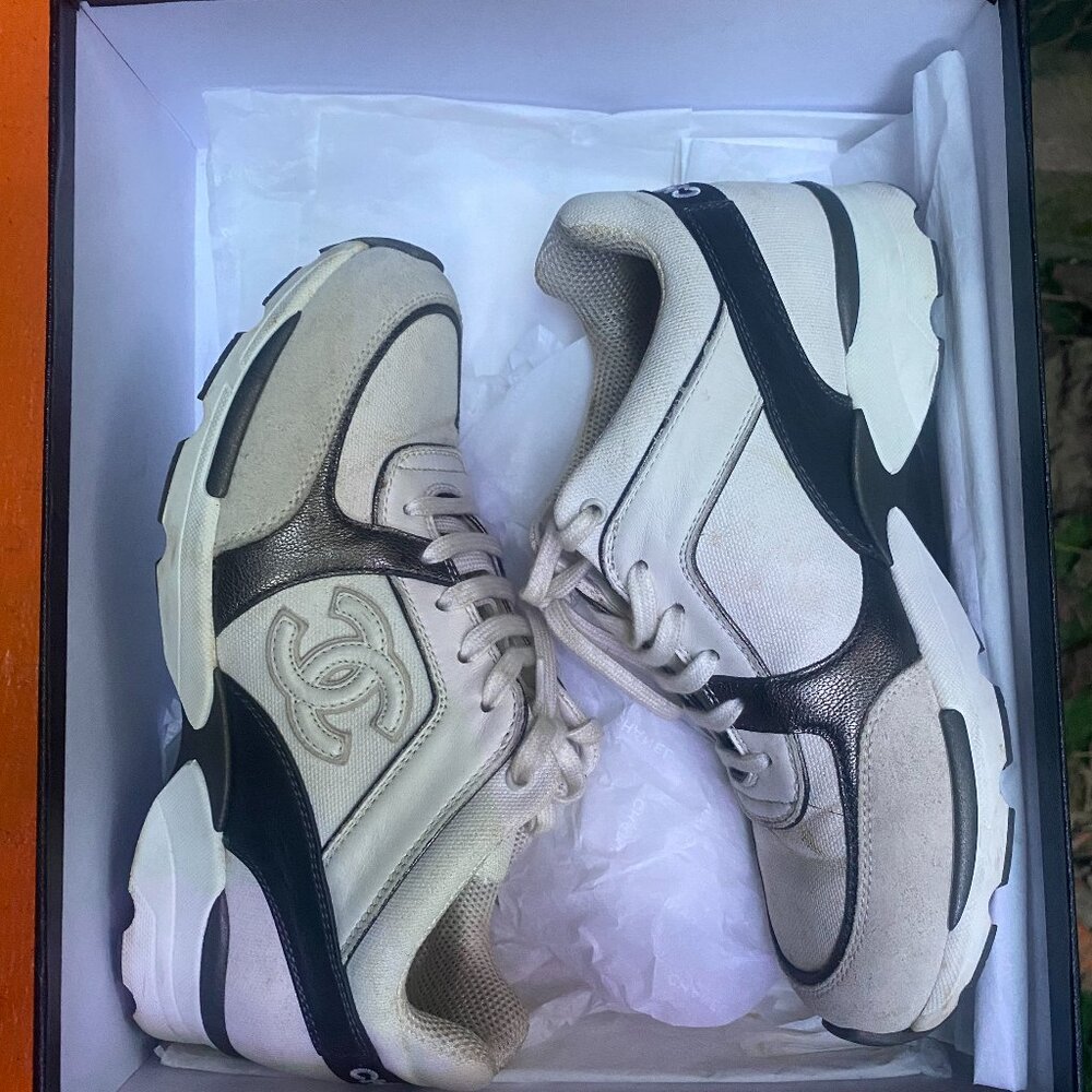 Chanel CC Logo Sneakers.